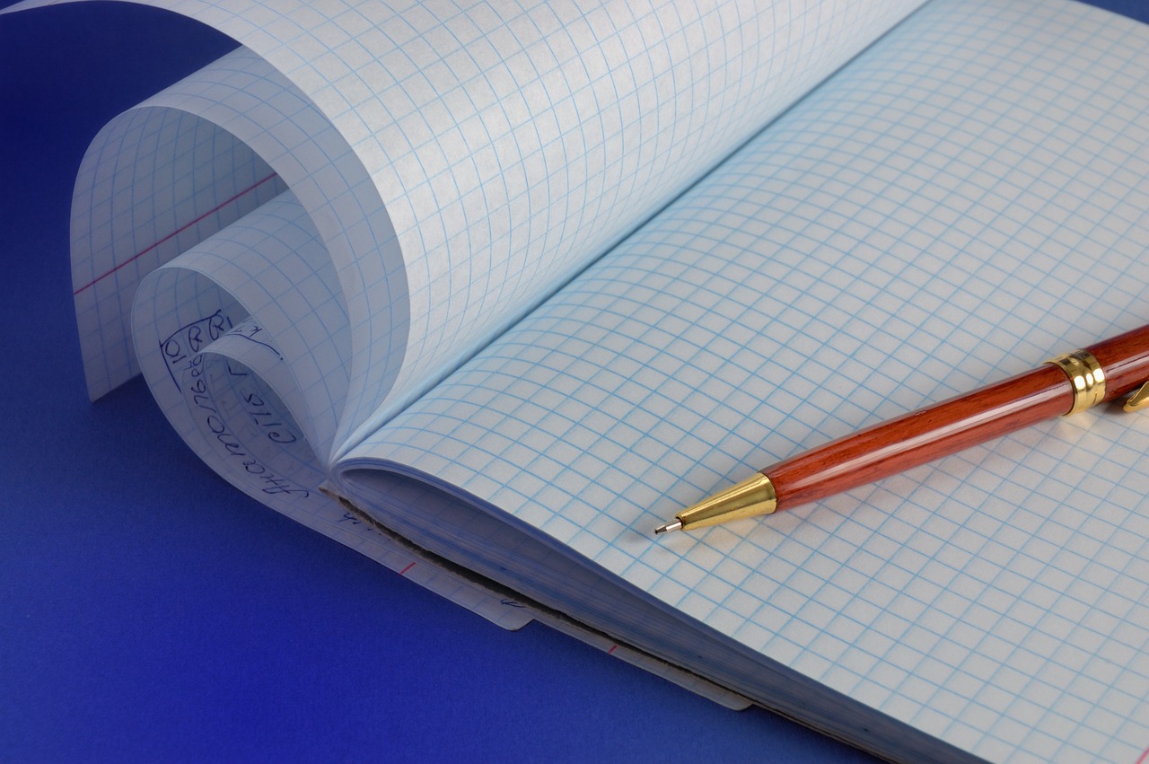 Heft mit Stift
